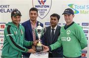 12 May 2017; Bangladesh captain Shakib Al Hasan holds the cup with Ireland captain William Porterfield alongside sponsors Moinul Haque Chowdury, CEO of Total Sports Marketing, centre left, and Uday Hakim, Senior Operative Director of Walton Group, after the match was called off due to rain during the International between Ireland and Bangladesh at Malahide in Co Dublin. Photo by Cody Glenn/Sportsfile