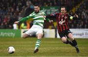 12 May 2017; Brandon Miele of Shamrock Rovers shoots to score his side's first goal despite the attempts of Derek Pender of Bohemians during the SSE Airtricity League Premier Division game between Bohemians and Shamrock Rovers at Dalymount Park in Dublin. Photo by David Maher/Sportsfile