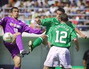 25 May 2002; Ian Harte and Mark Kinsella, 12, of Republic of Ireland in action against Tatsuhiko Kubo of Sanfrecce Hiroshima during the friendly match between Sanfrecce Hiroshima and Republic of Ireland at Hamayama Park in Izumo, Japan. Photo by David Maher/Sportsfile