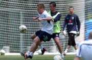 27 May 2002; Damien Duff, left, holds off the challange from his team-mate Gary Kelly during a Republic of Ireland squad training session at Izumo Sports Park in Izumo, Japan. Photo by David Maher/Sportsfile