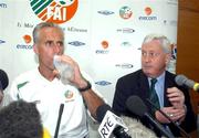 28 May 2002; Republic of Ireland manager Mick McCarthy, left, and FAI Chief Executive Brendan Menton answer questions relating to former team captain Roy Keane during a Republic of Ireland press conference at Izumo Sports Park in Izumo, Japan. Photo by David Maher/Sportsfile