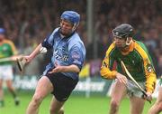 26 May 2002; Tomas McGrane of Dublin in action against Paul Gannon of Meath during the Guinness Leinster Senior Hurling Championship Quarter-Final match between Dublin and Meath at O'Connor Park in Tullamore, Offaly. Photo by Matt Browne/Sportsfile