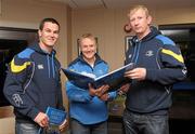 14 November 2011; Leinster Head Coach Joe Schmidt with players Jonathan Sexton and Leo Cullen at the launch of &quot;Rhapsody in Blue&quot;. The book, which has an RRP of €24.95, is on sale from www.leinsterrugby.ie, www.sportsfile.com and from select bookshops nationwide. Launch of &quot;Rhapsody in Blue&quot;, David Lloyd Riverview, Clonskeagh, Dublin. Photo by Sportsfile