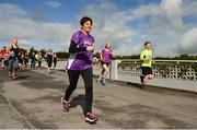 20 May 2017; Parkrun Ireland in partnership with Vhi, added their 63rd event on Saturday, May 20th, with the introduction of the Clonmel parkrun in the unique surrounds of Clonmel Racecourse. Parkruns take place over a 5km course weekly, are free to enter and are open to all ages and abilities, proving a fun and safe environment to enjoy exercise. To register for a parkrun near you visit www.parkrun.ie. New registrants should select their chosen event as their home location. You will then receive a personal barcode which acts as your free entry to any parkrun event worldwide. Pictured are particpants during the run including Kathryn McGagh of VHI. Photo by Sam Barnes/Sportsfile