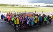 20 May 2017; Parkrun Ireland in partnership with Vhi, added their 63rd event on Saturday, May 20th, with the introduction of the Clonmel parkrun in the unique surrounds of Clonmel Racecourse. Parkruns take place over a 5km course weekly, are free to enter and are open to all ages and abilities, proving a fun and safe environment to enjoy exercise. To register for a parkrun near you visit www.parkrun.ie. New registrants should select their chosen event as their home location. You will then receive a personal barcode which acts as your free entry to any parkrun event worldwide. Pictured are, race director Niamh Byrne,  VHI representatives from left, Kathryn McGagh, Caroline O'Donoghue and Anne-Marie Brophy, with volunteers and participants ahead of the run. Photo by Sam Barnes/Sportsfile