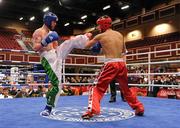 23 November 2011; Martin Kenny, left, from Dublin in action against Alemzihan Kudaibergenov from Kazakhstan during their 57kg full contact bout. 2011 WAKO World Kickboxing Championships, Citywest Conference Centre, Saggart, Dublin. Picture credit: Matt Browne / SPORTSFILE