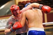 24 November 2011; John Mullally, from Dublin, left, exchanges punches with Ivan Tkachenko, from Ukraine, during his 91+ kg Quarter-Final bout. 2011 WAKO World Kickboxing Championships, Citywest Conference Centre, Saggart, Dublin. Picture credit: Matt Browne / SPORTSFILE