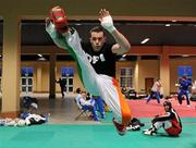 24 November 2011; Richard Kiely, from Tallaght, Co. Dublin, warming up before his 86 kg bout against Steveie Dement, from Puerto Rico. 2011 WAKO World Kickboxing Championships, Citywest Conference Centre, Saggart, Dublin. Picture credit: Matt Browne / SPORTSFILE