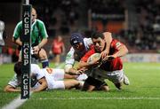 19 November 2011; Doug Howlett, Munster, is tackled just short of the try line by Jannie Bornman and Pierre Bernard, left, Castres Olympique. Heineken Cup, Pool 1, Round 2, Castres Olympique v Munster, Stade Ernest Wallon, Toulouse, France. Picture credit: Diarmuid Greene / SPORTSFILE
