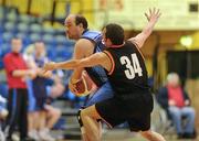 26 November 2011; Ollie Boyle, left, North West, Letterkenny, Co. Donegal, in action against Michael Mahon, Palmerstown Wildcats, Dublin. 2011 Special Olympics Ireland National Basketball Cup - Men, North West v Palmerstown Wildcats, National Basketball Arena, Tallaght, Dublin. Picture credit: Barry Cregg / SPORTSFILE