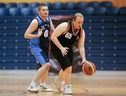 26 November 2011; Christopher Lyons, left, Palmerstown Wildcats, Dublin, in action against Daniel Cannon, North West, Letterkenny, Co. Donegal. 2011 Special Olympics Ireland National Basketball Cup - Men, North West v Palmerstown Wildcats, National Basketball Arena, Tallaght, Dublin. Picture credit: Barry Cregg / SPORTSFILE