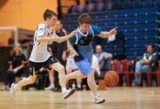 26 November 2011; Michael Losty, Cabra Lyons, Dublin, in action against Robert Larkin, Lucan Hedgehogs, Dublin. 2011 Special Olympics Ireland National Basketball Cup - Men, Lucan Hedgehogs v Cabra Lyons, National Basketball Arena, Tallaght, Dublin. Picture credit: Barry Cregg / SPORTSFILE