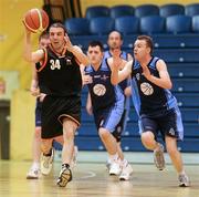 26 November 2011; Michael Mahon, left, Palmerstown Wildcats, Dublin, in action against Paddy Gamble, North West, Letterkenny, Co. Donegal. 2011 Special Olympics Ireland National Basketball Cup - Men, North West v Palmerstown Wildcats, National Basketball Arena, Tallaght, Dublin. Picture credit: Barry Cregg / SPORTSFILE