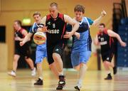 26 November 2011; Graeme Clark, left, Antrim Borough, in action against Michael Losty, Cabra Lyons. 2011 Special Olympics Ireland National Basketball Cup - Men, Antrim Borough v Cabra Lyons, National Basketball Arena, Tallaght, Dublin. Picture credit: Barry Cregg / SPORTSFILE