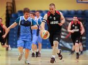 26 November 2011; Graeme Clark, right, Antrim Borough, in action against Michael Losty, Cabra Lyons. 2011 Special Olympics Ireland National Basketball Cup - Men, Antrim Borough v Cabra Lyons, National Basketball Arena, Tallaght, Dublin. Picture credit: Barry Cregg / SPORTSFILE