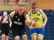 26 November 2011; Graeme Clark, left, Antrim Borough, in action against Robert McDonald, Navan Arch Club. 2011 Special Olympics Ireland National Basketball Cup - Men, Antrim Borough v Navan Arch Club, National Basketball Arena, Tallaght, Dublin. Picture credit: Barry Cregg / SPORTSFILE