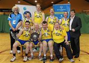 26 November 2011; The Navan Arch Club, Co. Meath, team celebrate with the Division 2 plate. 2011 Special Olympics Ireland National Basketball Cup - Men, National Basketball Arena, Tallaght, Dublin. Picture credit: Barry Cregg / SPORTSFILE