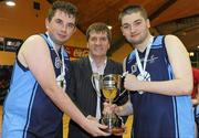 26 November 2011; Joint North West, Letterkenny, Co. Donegal, joint captains Michael Leavy, left, and Daniel Cannon, right, are presented with the Division 1 trophy by Special Olympics Ireland CEO Matt English. 2011 Special Olympics Ireland National Basketball Cup - Men, National Basketball Arena, Tallaght, Dublin. Picture credit: Barry Cregg / SPORTSFILE