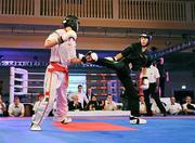 26 November 2011; Ashley St Mart, right, Ireland, in action against the eventual winner Laszlo Varga, Hungary, during their 57 kg semi contact bout. 2011 WAKO World Kickboxing Championships, Citywest Conference Centre, Saggart, Dublin. Picture credit: Matt Browne / SPORTSFILE