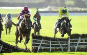 3 December 2011; Toostrong, left, with Davy Russell up, jumps the last on their way to winning the Fairyhouse Premier Jump Weekend Maiden Hurdle with eventual second place Star Neuville, with Brian Hayes up. Fairyhouse Racecourse, Co. Meath. Picture credit: Matt Browne / SPORTSFILE