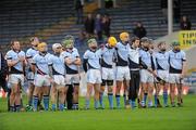 4 December 2011; The Na Piarsaigh team stand for the national anthem. AIB Munster GAA Hurling Senior Club Championship Final, Na Piarsaigh, Limerick v Crusheen, Clare, Semple Stadium, Thurles, Co. Tipperary. Picture credit: Barry Cregg / SPORTSFILE