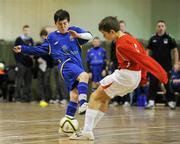 6 December 2011; James Adair, Scoil Mhuire, Buncrana, Co. Donegal, in action against James Doherty, St. Muredach's College, Ballina, Co. Mayo. FAI All-Ireland Post Primary Schools First Year Futsal Finals, Franciscan College, Sports Centre, Gormanston, Co. Meath. Picture credit: Brian Lawless / SPORTSFILE