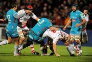 9 December 2011; Rory Best, Ulster, is tackled by Lorenzo Romano, Aironi. Heineken Cup, Pool 4, Round 3, Ulster v Aironi, Ravenhill Park, Belfast, Co. Antrim. Picture credit: Oliver McVeigh / SPORTSFILE