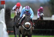 11 December 2011; Rubi Light, with Andrew Lynch up, on their way to winning the John Durkan Memorial Punchestown Steeplechase after jumping the last. Horse Racing, Punchestown, Co. Kildare. Picture credit: Matt Browne / SPORTSFILE