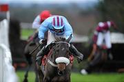 11 December 2011; Rubi Light, with Andrew Lynch up, on their way to winning the John Durkan Memorial Punchestown Steeplechase after jumping the last. Horse Racing, Punchestown, Co. Kildare. Picture credit: Matt Browne / SPORTSFILE