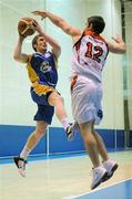 17 December 2011; Scott Kinnevane, UL Eagles, in action against Peder Madsen, Killester. Nivea for Men Superleague, UL Eagles v Killester, UL Arena, Limerick. Picture credit: Diarmuid Greene/ SPORTSFILE