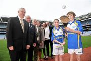 20 December 2011; Representives from the GAA games, from left, Uachtarán Chumann Lúthchleas Gael Criostóir Ó Cuana, Pat Quill, President of the Ladies Gaelic Football Association, Joe O'Donoghue, President of the Rounders Association, Sinead O'Connor, Ard Stiúrthoir of the Camogie Association, Eavan Mulligan, Operations Manager of the Handball Association, and Jim Geraghty, Senior Brand Manager, Lucozade Sport, with youth players Clare Nulty, age 13, and Barry Neville, age 14, from Castleknock GAA Club, in attendance at  the GAA Games Development Conference  Launch. The Conference will take place on January 14th 2012 in Croke Park. Following on from the success of the 2010 Conference- which focused on issues related to the development of the child layer - the 2011 Conference will focus on issues related to the Youth Player (aged 13 - 18 years). Croke Park, Dublin. Picture credit: Brian Lawless / SPORTSFILE