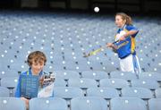 20 December 2011; Barry Neville, age 14, and Clare Nulty, age 13, from Castleknock GAA Club, in attendance at the GAA Games Development Conference  Launch. The Conference will take place on January 14th 2012 in Croke Park. Following on from the success of the 2010 Conference- which focused on issues related to the development of the child layer - the 2011 Conference will focus on issues related to the Youth Player (aged 13 - 18 years). Croke Park, Dublin. Picture credit: Brian Lawless / SPORTSFILE