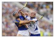 10 July 2011; John Mullane, Waterford, in action against Paddy Stapleton, Tipperary. Munster GAA Hurling Senior Championship Final, Waterford v Tipperary, Pairc Ui Chaoimh, Cork. Picture credit: Diarmuid Greene / SPORTSFILE