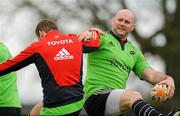 22 December 2011; Munster's John Hayes warms up with Denis Fogarty, left, during squad training ahead of their Celtic League game against Connacht on Monday. Munster Rugby Squad Training, Kilballyowen Park, Bruff, Co. Limerick. Picture credit: Diarmuid Greene / SPORTSFILE