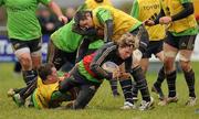 22 December 2011; Munster's Danny Barnes is tackled by JJ Hanrahan, left, and James Coughlan during squad training ahead of their Celtic League game against Connacht on Monday. Munster Rugby Squad Training, Kilballyowen Park, Bruff, Co. Limerick. Picture credit: Diarmuid Greene / SPORTSFILE