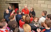 22 December 2011; Munster's John Hayes signs autographs for supporters after squad training ahead of their Celtic League game against Connacht on Monday. Munster Rugby Squad Training, Kilballyowen Park, Bruff, Co. Limerick. Picture credit: Diarmuid Greene / SPORTSFILE