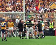 22 August 1998; Offaly players argue with referee Jimmy Cooney after he blew the full-time whistle early at Guinness All-Ireland Hurling All-Ireland Senior Championship Semi-Final Replay match between Clare and Offaly at Croke Park in Dublin. Photo by Ray McManus/Sportsfile