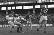 13 July 1980; Frank Cummins of Kilkenny clears under pressure from Pat Kirwan of Offaly during the Leinster Senior Hurling Championship Final match between Kilkenny and Offaly at Croke Park, Dublin. Photo by Ray McManus/Sportsfile