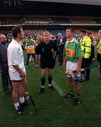 22 August 1998; Referee Michael Wadding performs the pre-match coin toss with team captains Tony Spain of Kildare and Conor Flaherty of Kerry before the All Ireland Under-21 'B' hurling Final between Kerry and Kildare at Croke Park in Dublin. The game was postponed due to a protest on the pitch by Offaly supporters due to the amount of time played in their Guinness All-Ireland Senior Hurling Championship Semi-Final defeat to Clare in the previous game. Photo by Ray McManus/Sportsfile