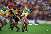 22 August 1998; Kevin Martin of Offaly in action against Jamesie O'Connor of Clare during the Guinness All-Ireland Hurling All-Ireland Senior Championship Semi-Final Replay match between Clare and Offaly at Croke Park in Dublin. Photo by Ray McManus/Sportsfile