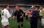 22 August 1998; Referee Michael Wadding with team captains Tony Spain of Kildare and Conor Flaherty of Kerry before the All Ireland Under-21 'B' hurling Final match between Kerry and Kildare at Croke Park in Dublin. The game was postponed due to a protest on the pitch by Offaly supporters due to the amount of time played in their Guinness All-Ireland Senior Hurling Championship Semi-Final defeat to Clare in the previous game. Photo by Ray McManus/Sportsfile
