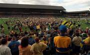 22 August 1998; Clare Fans look on as Offaly supporters protest after the referee ended the match 3 mins early  , Clare v Offaly Replay, Croke Park. Photo by David Maher/Sportsfile