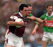 2 June 2002; Padraig Joyce of Galway is tackled by David Heaney of Mayo during the Bank of Ireland Connacht Senior Football Championship Semi-Final match between Mayo and Galway at MacHale Park in Castlebar, Mayo. Photo by Ray McManus/Sportsfile