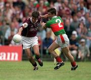 2 June 2002; Ray Connelly of Mayo in action against Galway's Matthew Clancy during the Bank of Ireland Connacht Senior Football Championship Semi-Final match between Mayo and Galway at MacHale Park in Castlebar, Mayo. Photo by Ray McManus/Sportsfile