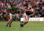 2 June 2002; Paul Clancy of Galway in action against Gary Ruane of Mayo during the Bank of Ireland Connacht Senior Football Championship Semi-Final match between Mayo and Galway at MacHale Park in Castlebar, Mayo. Photo by Ray McManus/Sportsfile