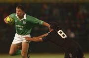 8 June 2002; Justin Bishop of Ireland is tackled by New Zealand's Mutu Ngarimu during the Summer Tour 2002 match between New Zealand Divisional XV and Ireland XV at the Alpine Energy Stadium in Timaru, New Zealand. Photo by Matt Browne/Sportsfile