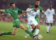 11 June 2002; Gary Breen of Republic of Ireland in action against Al Hasan Al Yami of Saudi Arabia during the FIFA World Cup 2002 Group E match between Saudi Arabia and Republic of Ireland at the International Stadium Yokohama in Yokohama, Japan. Photo by David Maher/Sportsfile