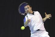 30 December 2011; Lazio Kukhalashvili, DCU, Co. Dublin, in action against Ciaran Fitzgerald, Greystones, Co. Wicklow, during their Men's Singles semi-final. National Indoor Tennis Championship Semi-Finals, David Lloyd Riverview, Clonskeagh, Dublin. Photo by Sportsfile