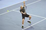 30 December 2011; John McGahan, Dundalk, Co. Louth, in action against Niall Fitzgerald, Greystones, Co. Wicklow, during their Men's Singles semi-final. National Indoor Tennis Championship Semi-Finals, David Lloyd Riverview, Clonskeagh, Dublin. Photo by Sportsfile