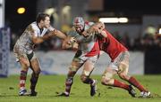 30 December 2011; Dan Tuohy, Ulster, is tackled by Dave O'Callaghan, Munster. Celtic League, Ulster v Munster, Ravenhill Park, Belfast, Co. Antrim. Picture credit: Oliver McVeigh / SPORTSFILE